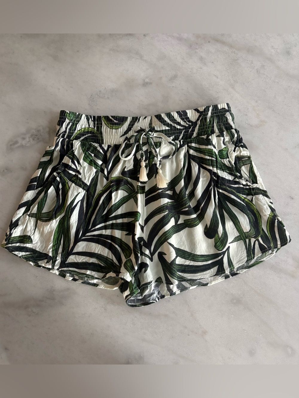 Show Me Your MuMu White Tropical Leaf Tassel Drawstring Shorts